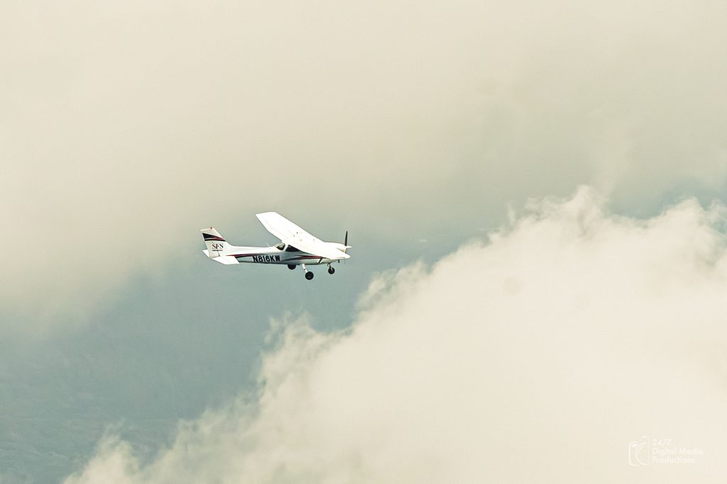 cessna 172 flying in the clouds